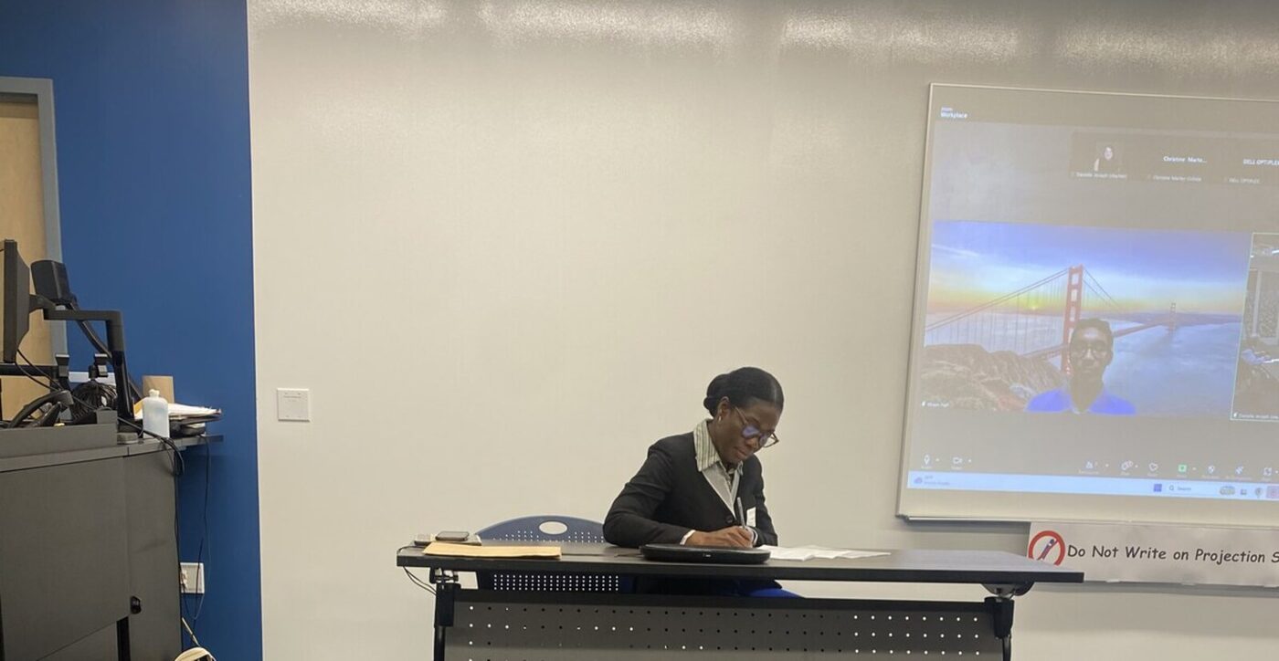 Moderator Ngozi Bell leading the panel, with Itbaan Nafi on the screen