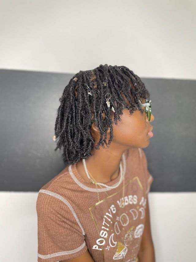 Knot Our Hair logo